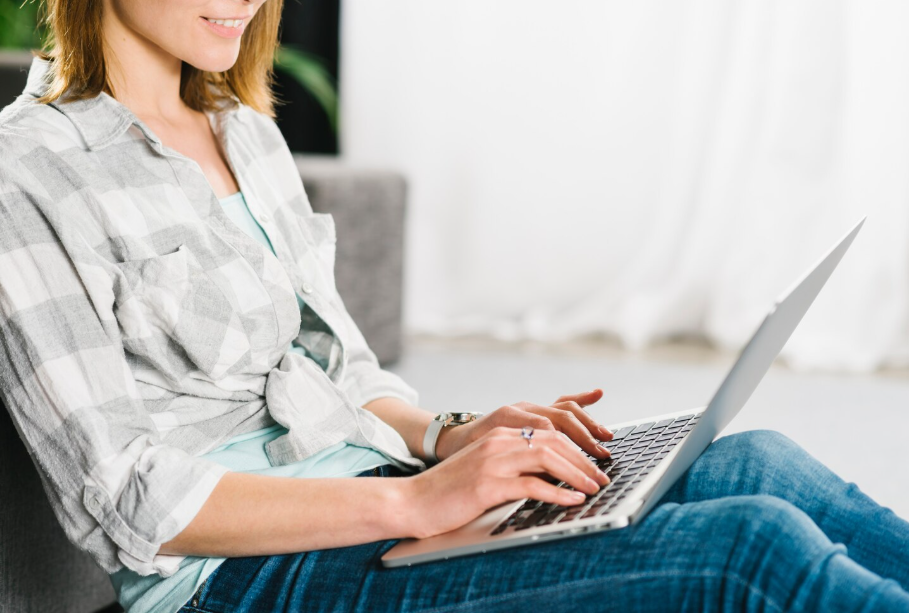 School leader reviewing enrollment marketing online